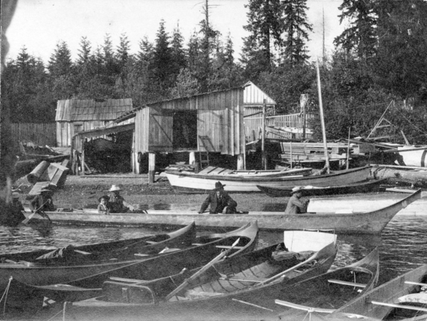 1280px-Canoes_and_a_boathouse_at_Brockton_Point_1897