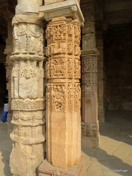 14 Qutub Minar Cloister columns at Quwwat ul-Islam Mosque sporting Hindu iconography[