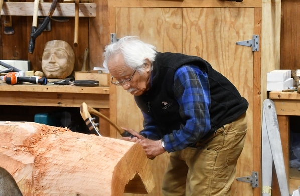 Nathan Jackson works on a totem pole at Saxman Village's Totem Park.