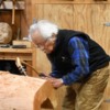 Nathan Jackson works on a totem pole at Saxman Village's Totem Park.