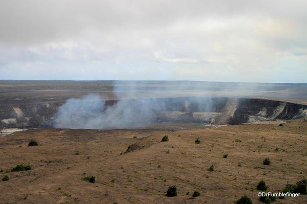 Volcanoes National Park. Smoke rises from the Halema