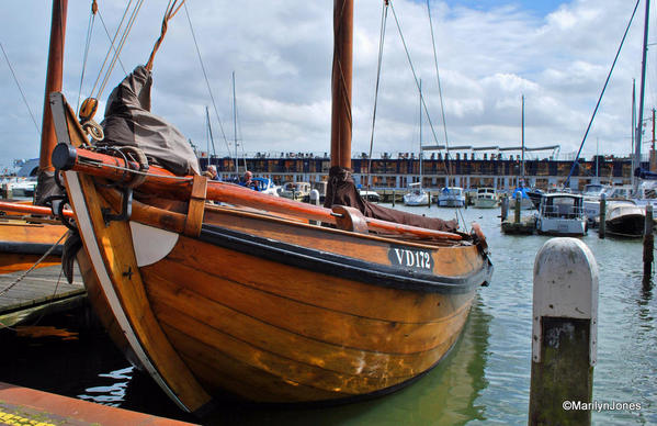 Sailing vessels are moored in Volendam