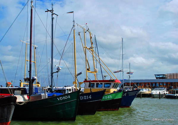 Sailing vessels are moored in Volendam