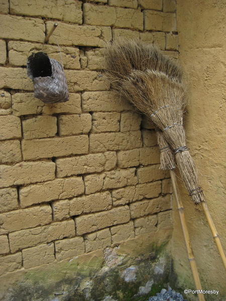 Broom with bird nest.