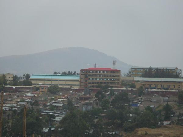 Addis shanty towns. Notice the tall buildings behind the shanty towns