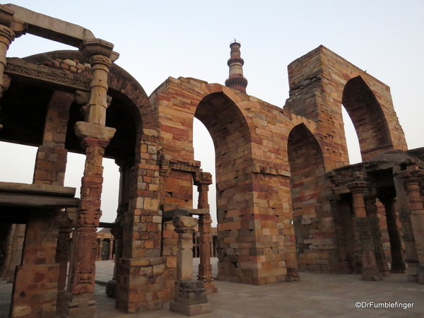 08 Qutub Minar. Mosque courtyard with arch screen