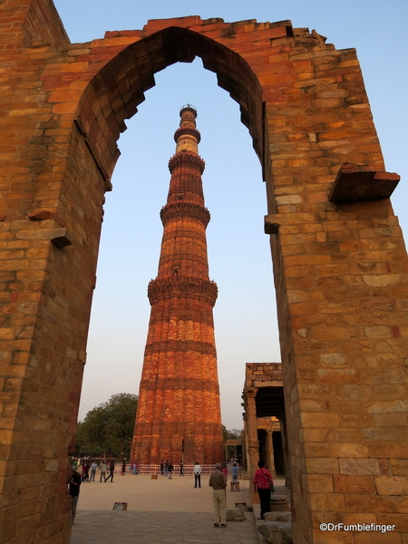 09 Qutub Minar. Mosque courtyard with arch screen