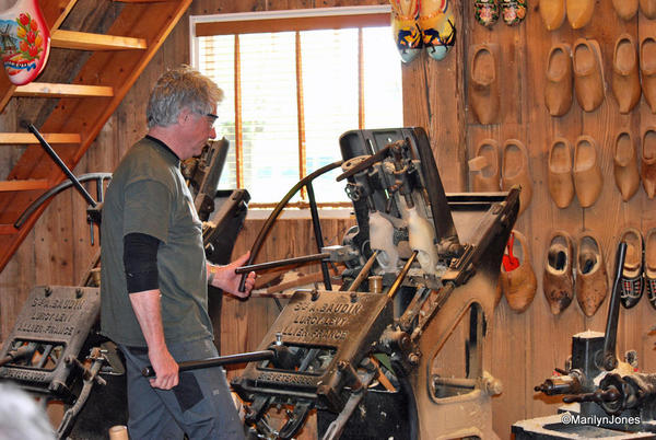 A craftsman shows how clogs are made on a century-old machine. Second, the inside is carved out