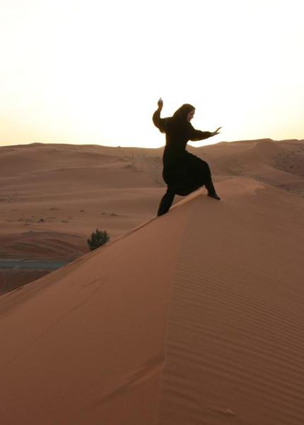 Saudi Arabia Riyadh. Conquering the sands in an abaya