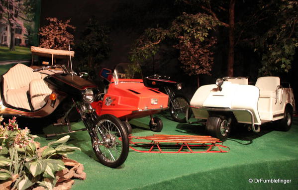 Elvis Presley Automobile Museum. Assorted scooters and boy toys.