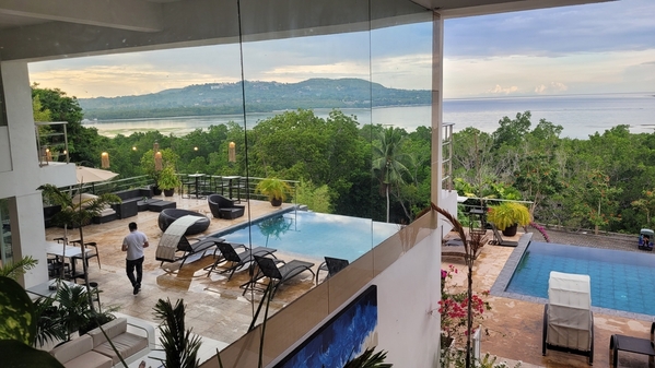 Reflected infinity pool at Ocean Suites