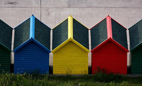 Beach huts at West Cliff.