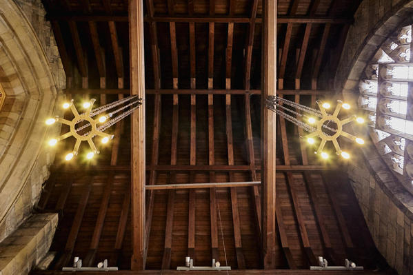 Ceiling detail hanging lights and window.