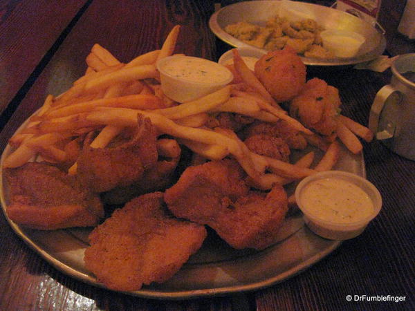 Southern cooking. Fried catfish, hush puppies and fries. Delicious!