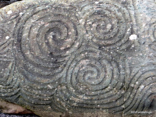 Triple swirl design at the entrance to the tomb is of unknown significance