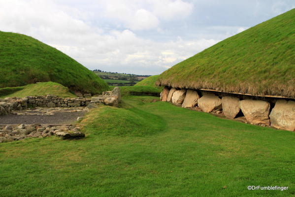 Note the kerbstones around the largest burial mound in Knowth (to the right)